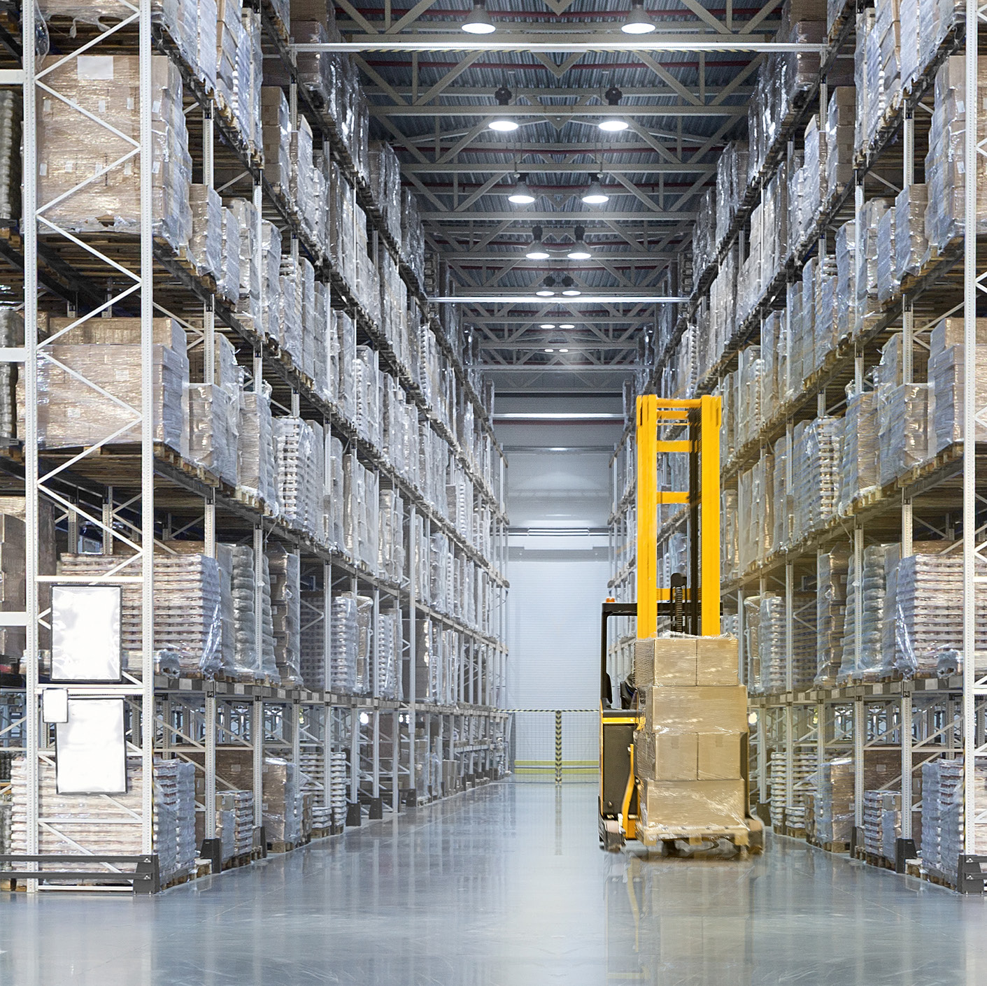 GBK Exports warehouse aisle stacked with palletised products